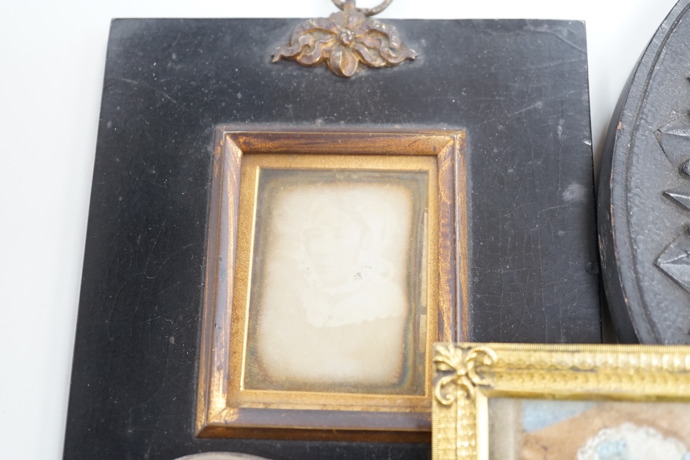 Continental School, 18th century, portrait miniature on ivory, Portrait of a Lady in a red dress, together with six other portraits. To include the subject of military interest: a portrait watercolour of General Isaac Br